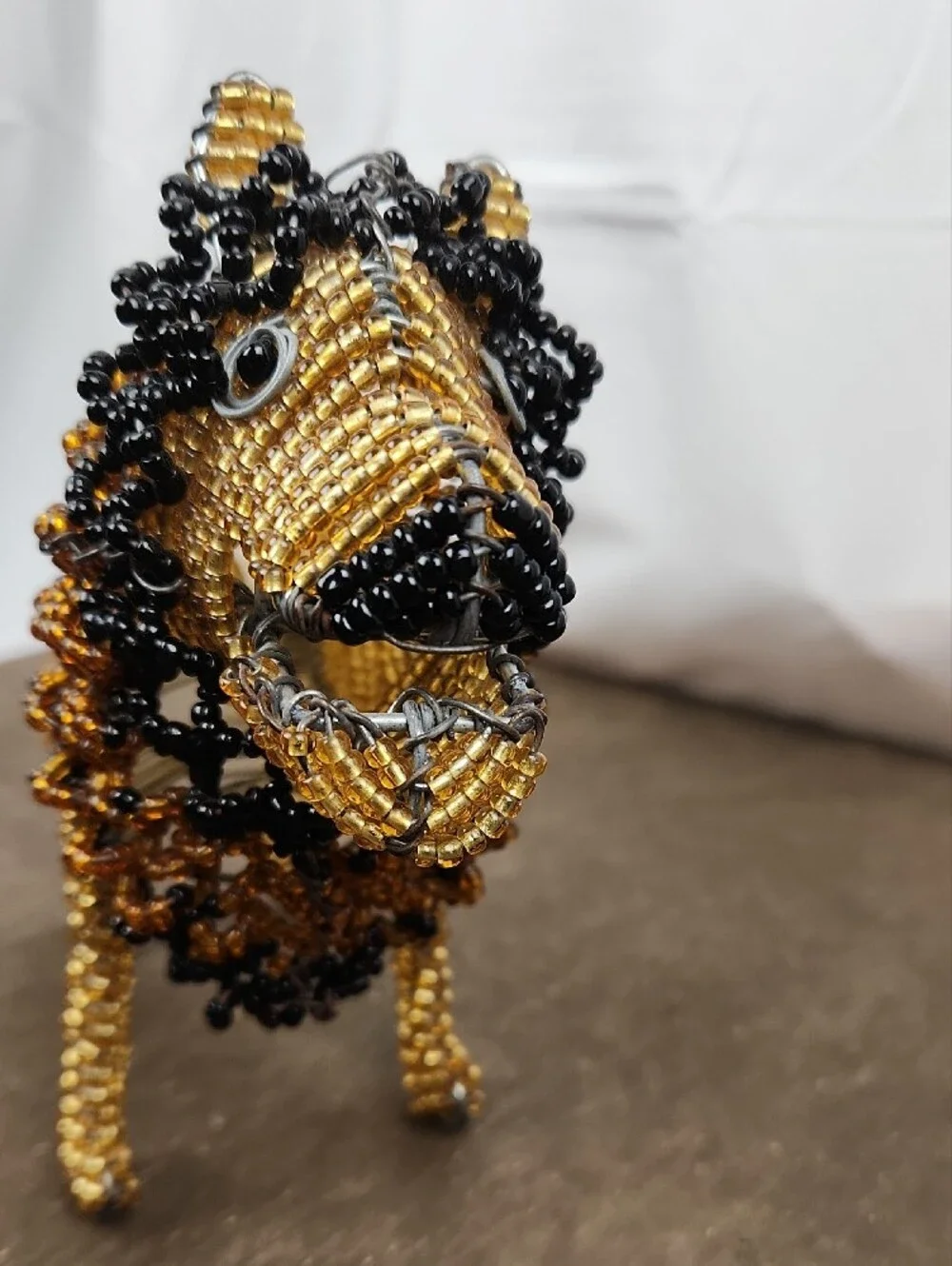Handcrafted Beaded Lion Accent in Gold and Black